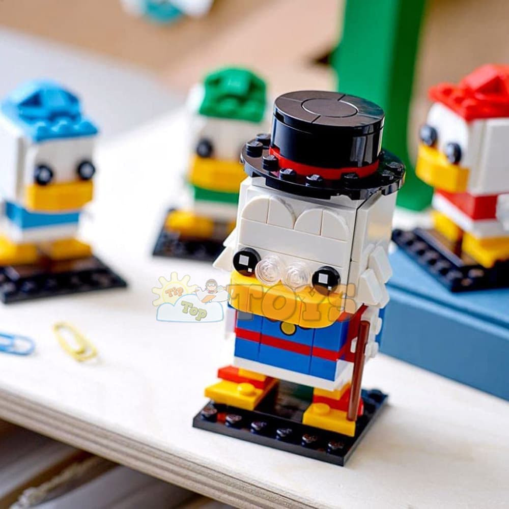 LEGO® Brick Headz Scrooge McDuck Huey Dewey și Louie 40477